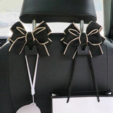 Flyshadow Creative Cute Bowknot Car Seat Back Storage Hooks Vehicle Headrest Organizer Hanger for Groceries Bag Handbag Car Accessories