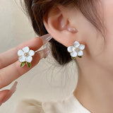 Flyshadow Trendy Cute White Flower Stud Earrings for Women Girls Enamel Oil Camellia Green Leaf Crystal Imitation Pearl Earrings Jewelry