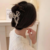 Flyshadow Fashion Pearl Hair Claw Clip for Women Pearl Bow Claw clip Metal Hair Accessories Hollow Barrette Crystal Ponytail Clip Ornament