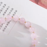 Flyshadow Stylish Natural Pink Crystal Bracelet with 8mm Beads Unique Jewelry with Starlight Plum Blossom and Flower Design Pendant