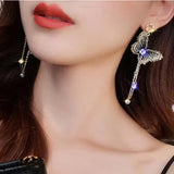 Flyshadow Fashionable Long Tassel Needle Embroidered Butterfly Earrings Simple Versatile Pearl Earrings Sweet Slimming Earrings