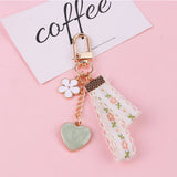 Flyshadow Small Daisy Flower Keychain For Women Cute Bell Heart Leaves Ribbon Key Chains Bag Car Mobile Phone Key Ring Accessories Gift