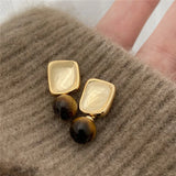 Flyshadow New Europe Style Geometric Metal Tiger Eye Stone Earrings For Women Personality Drop Earrings Jewelry Gift