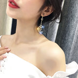 Flyshadow Round Face Slimming Earrings Versatile Student Korean Version Internet Celebrity Niche Hollowed Out Star Moon Earrings